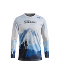 A long-sleeve athletic jersey with a blue and white mountain landscape graphic on the front, featuring the text 'Uncharted Sikkim' and a small 'RS' logo near the collar, shown on a plain white background.